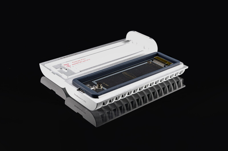 Cutaway view of a wide-format scanner showing internal components and scanning mechanism