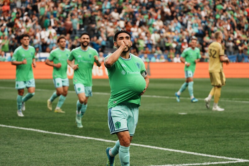Seattle Sounders FC captain Cristian ROldan celebrates after scoring a goal