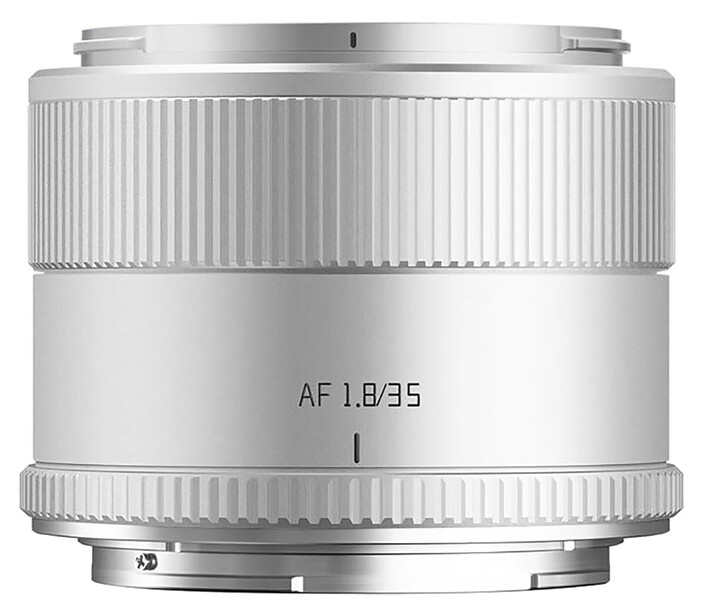 Silver prime lens with AF 1.8/35 markings and ribbed focus ring