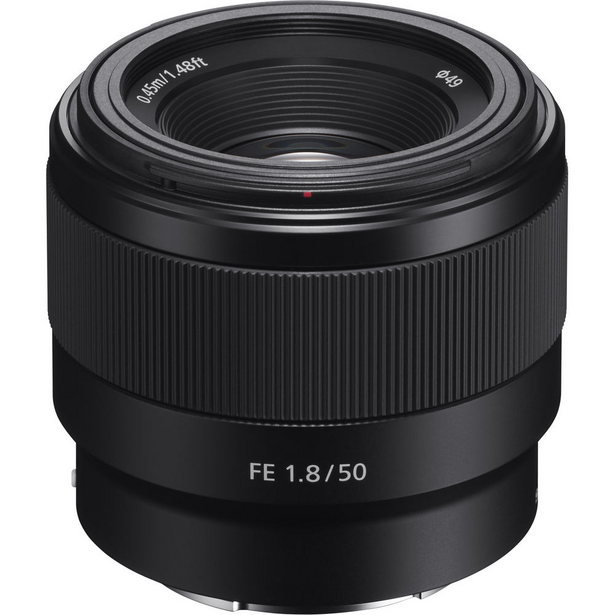 Sony FE 1.8/50 prime lens with black barrel and focusing ring against white background