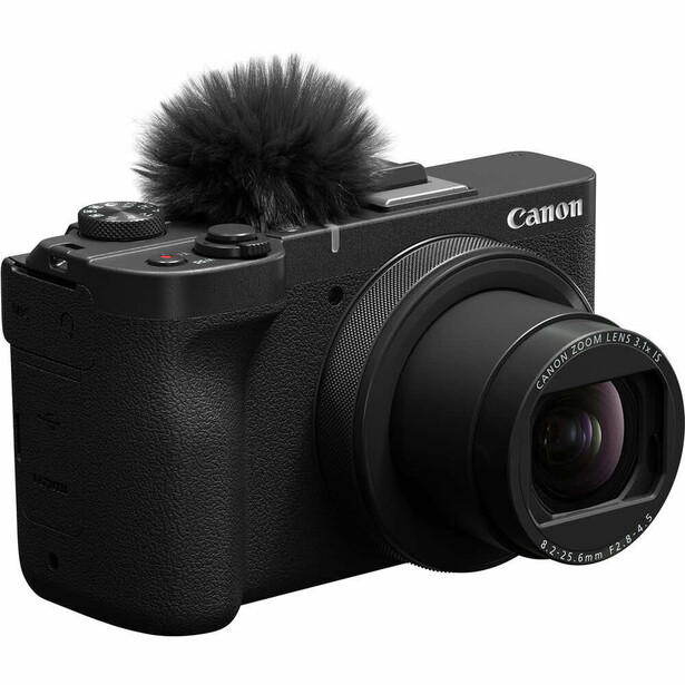 Canon PowerShot V70-35 compact camera with attached shotgun microphone on white background