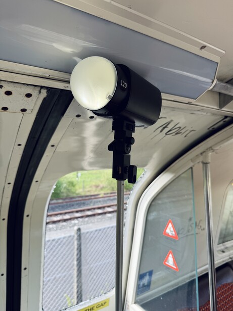 Ring light mounted on transit bus interior above window