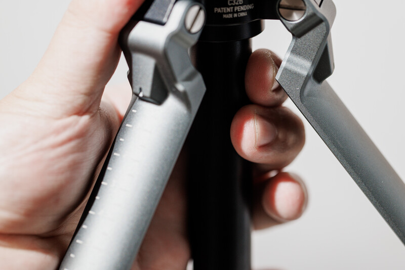 Close-up of hands holding a camera body showing grip and ergonomics
