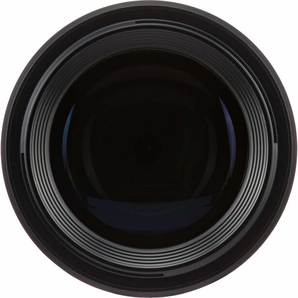 Front view of a telephoto lens showing the glass element and focus ring