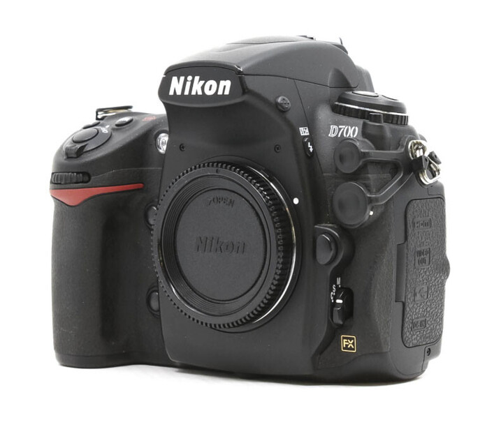 Nikon D700 DSLR camera body shown from a three-quarter angle against white background