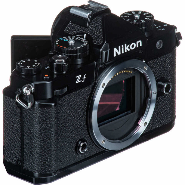 Nikon Z f mirrorless camera body shown from front three-quarter angle with lens mount exposed