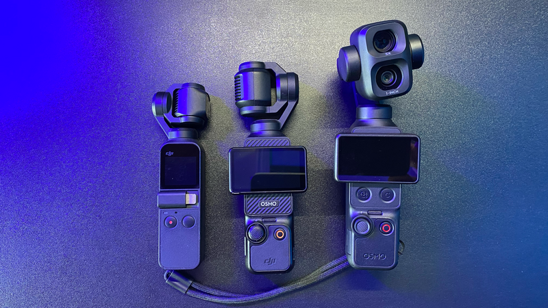 Three DJI gimbal stabilizers arranged by size from smallest to largest against blue gradient background
