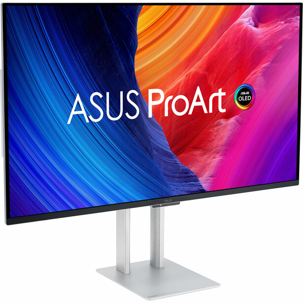 ASUS ProArt professional monitor displaying vibrant blue, orange, and magenta gradient test pattern