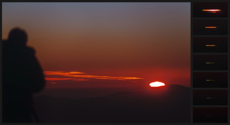 Silhouetted figure watching a vivid red sunset with a large sun on the horizon
