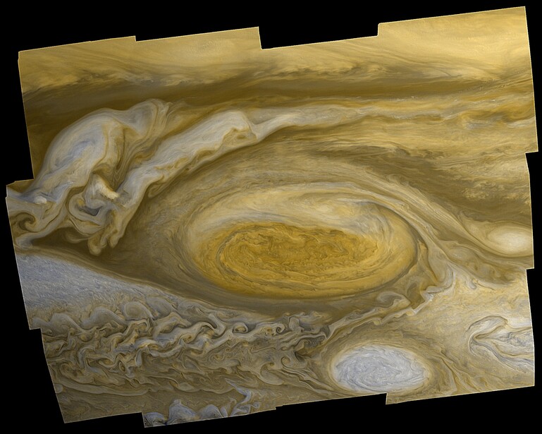 Jupiter's Great Red Spot and atmospheric bands in golden and white tones