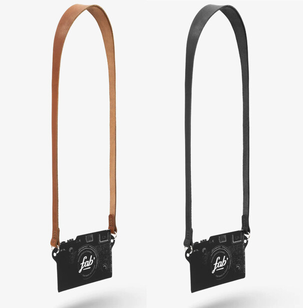 Two camera shoulder straps in brown leather and black fabric with branded hardware