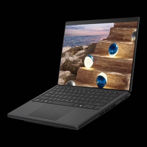 Laptop displaying landscape photography with coastal rock formations and blue circular light effects overlaid on screen