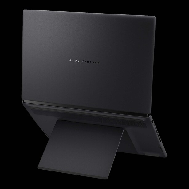 Asus ProArt display monitor with articulating stand shown from rear three-quarter view against black background