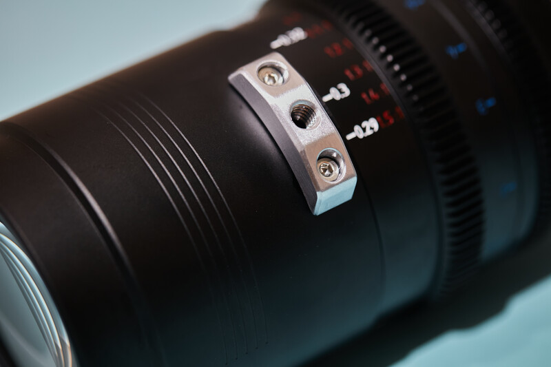 Close-up of cinema lens focus ring and markings with depth of field scale