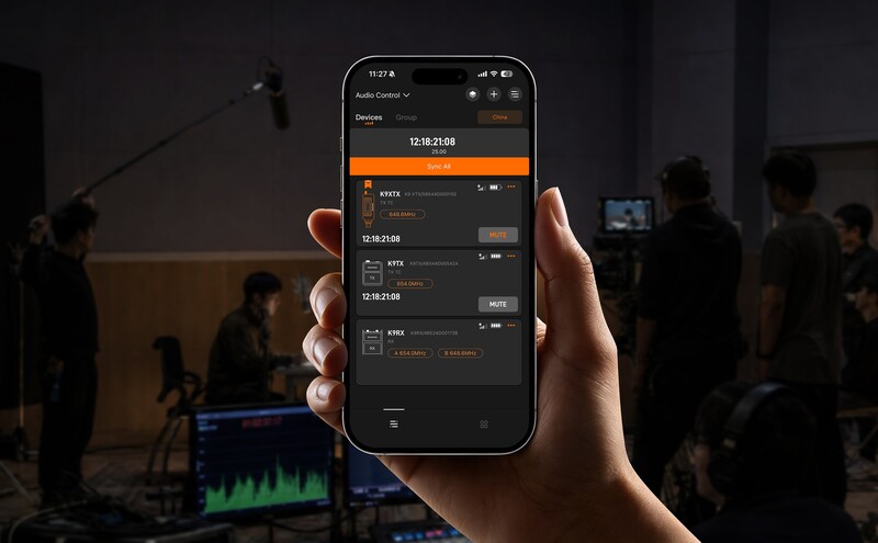 Smartphone displaying audio editing interface with waveforms and timeline controls during production shoot
