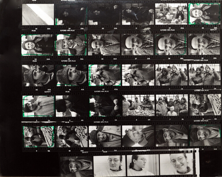 A black-and-white contact sheet on Ilford HP5 Plus film: the whole roll printed at its true negative size in one grid, with grease-pencil marks picking out the frames worth enlarging