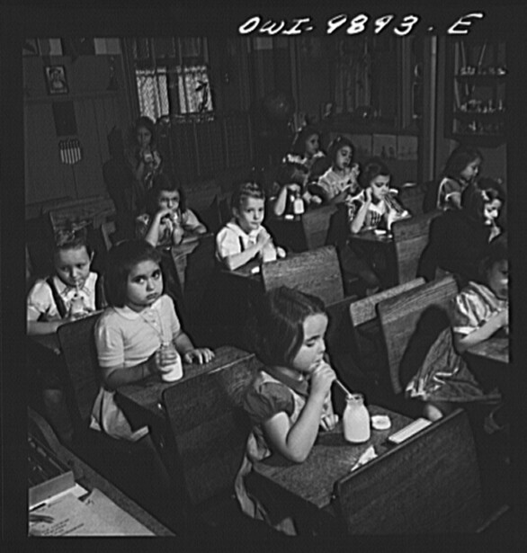 First graders drink their morning milk in a New York City public school in October 1942
