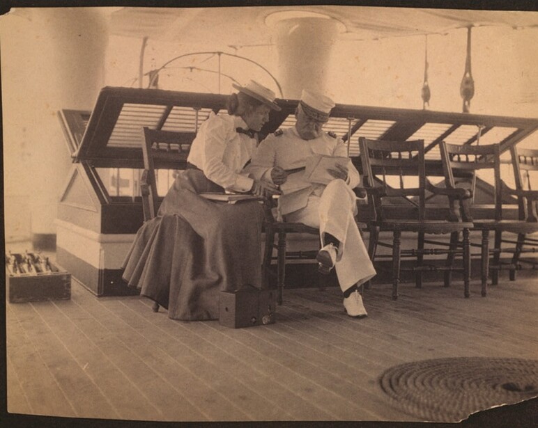 Admiral George Dewey and Frances Benjamin Johnston on the deck of the USS Olympia in 1899, from her exclusive series made aboard the flagship at Naples