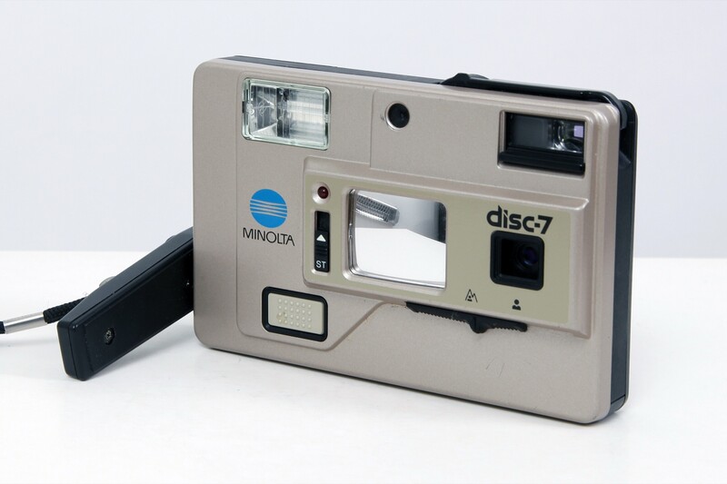 The Minolta Disc-7, a licensed disc camera whose front-mounted convex mirror let you frame a self-portrait years before the selfie