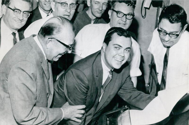 Jackson, center, congratulated by Dallas Times Herald colleagues in early May 1964, just after the Pulitzer board announced the prize