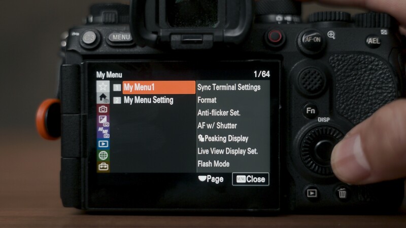 Sony mirrorless camera rear LCD screen displaying custom menu settings with navigation options