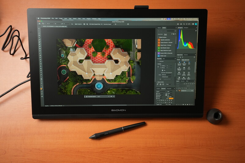 Wacom display tablet showing landscape design software with aerial view of garden layout
