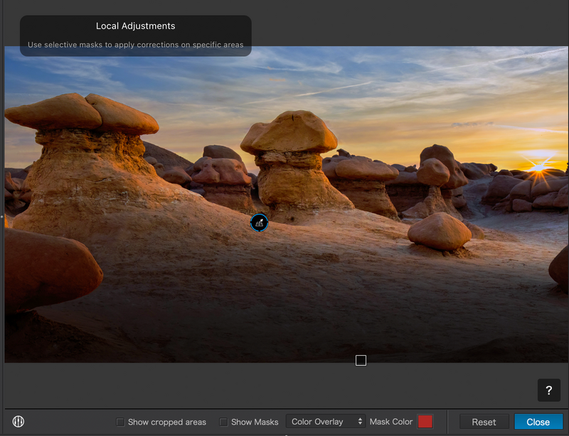 Screenshot of photo editing software showing Local Adjustments panel with desert rock formations at sunset