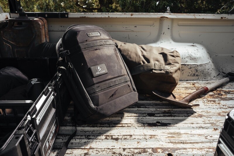 The PX25 Aegis Travel Pack in the bed of a pickup truck. 