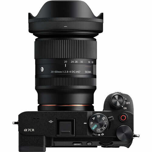 Sony α7C-B mirrorless camera with wide-angle zoom lens and hood attached, shown from above