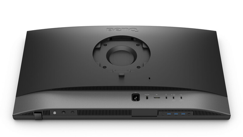 Rear view of a curved monitor displaying ports and cable management