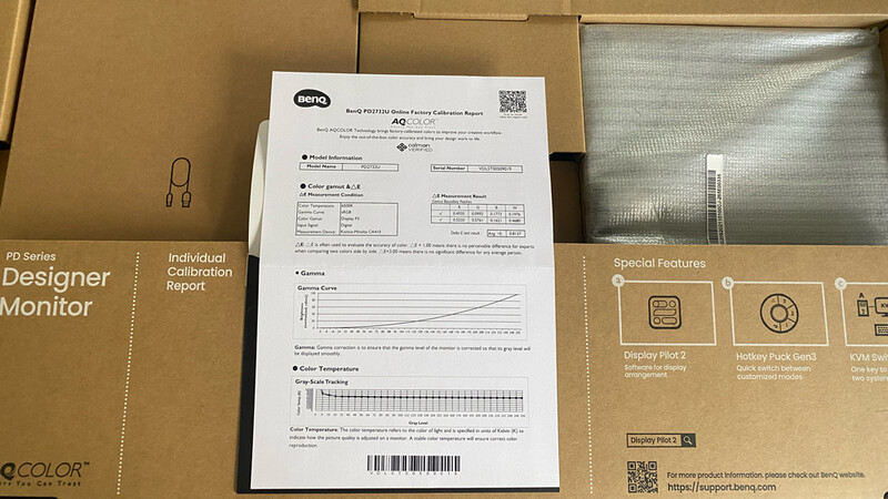 BenQ monitor calibration report and packaging materials displayed together