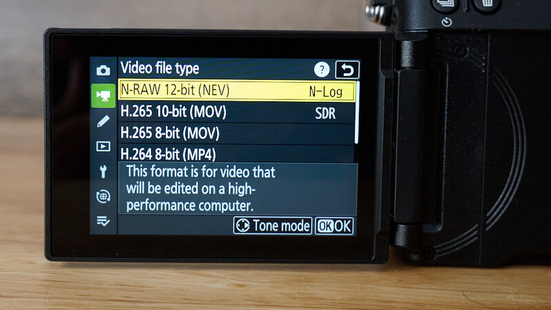 Screenshot of video file type menu on camera LCD displaying N-RAW, H.265, and H.264 format options