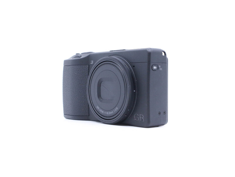 Ricoh GR III compact digital camera with fixed lens, shown from front three-quarter angle against white background