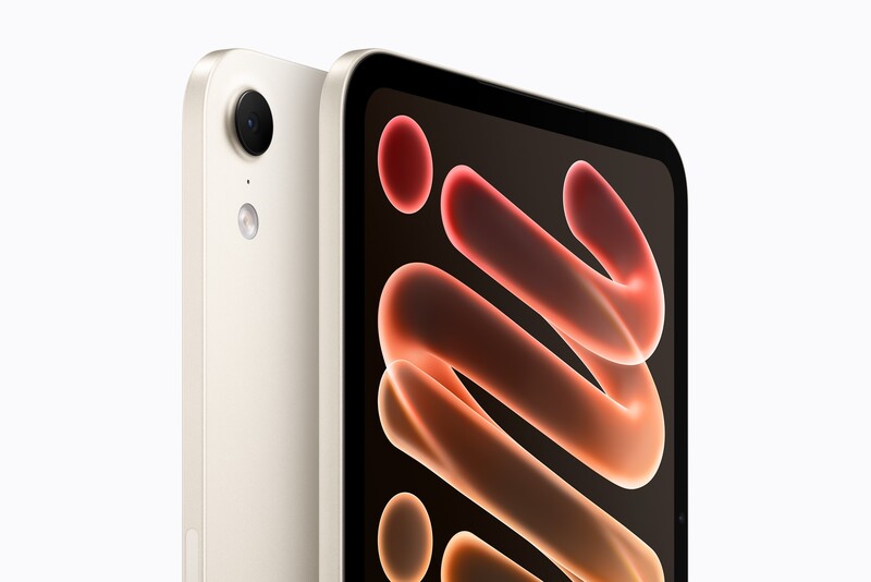 The iPad mini in starlight, with its 12MP f/1.8 rear camera and Adaptive True Tone flash.