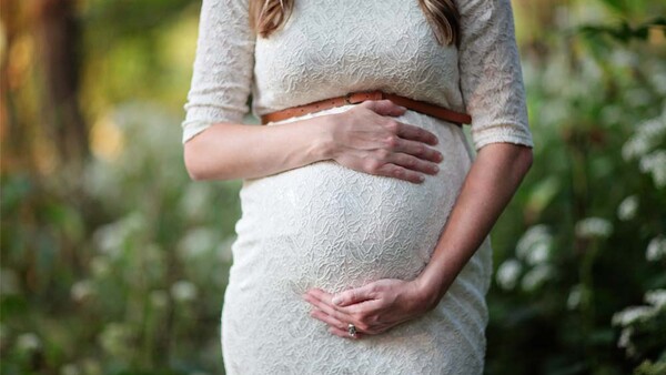 Client Fires Photographer From Maternity Shoot After Learning She's a Lesbian