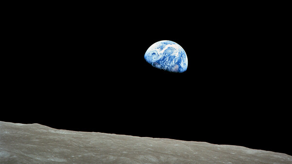 The Power of Photography: 50 Years After Breaking the Bonds of Gravity