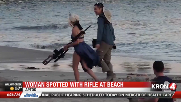 Photographer and Model Spotted Using Huge Fake Rifle in Public Beach Photoshoot