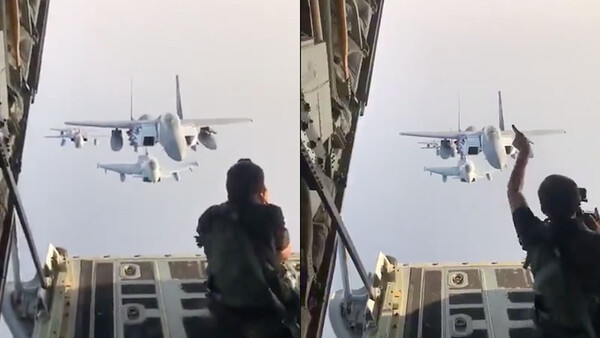 Daredevil Photographer Sits on Cargo Door to Take Pictures of Jets Flying Directly Behind Him
