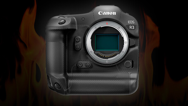 Canon EOS R3 mirrorless camera body with exposed sensor mount, photographed against dark background with warm lighting.