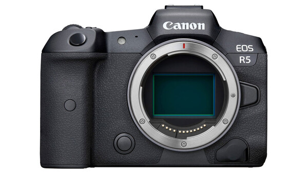 Canon EOS R5 mirrorless camera body front view with sensor visible through open mount.
