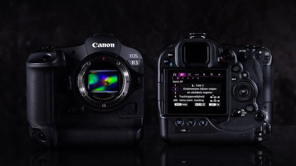Canon EOS R3 mirrorless camera displayed from front and back views against dark background.