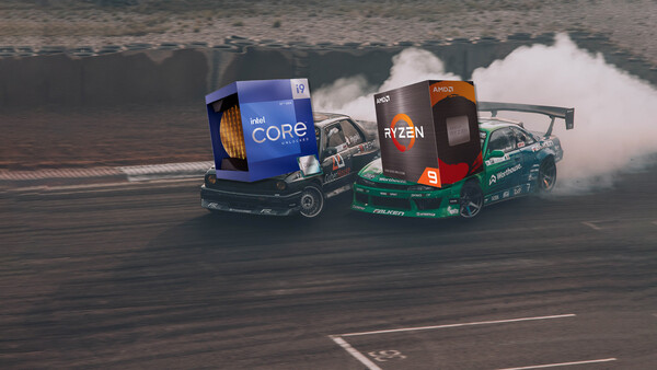 Two custom vehicles branded with processor logos performing a drift on an asphalt surface, creating tire smoke.