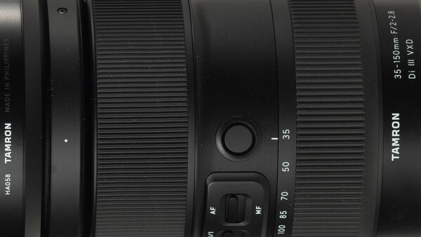 Tamron 35-150mm f/2.8-4 zoom lens showing focal length markings and focus ring controls.
