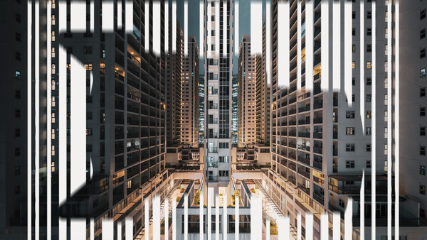 Urban canyon view through geometric white vertical lines, dense apartment buildings converging toward distant courtyard.