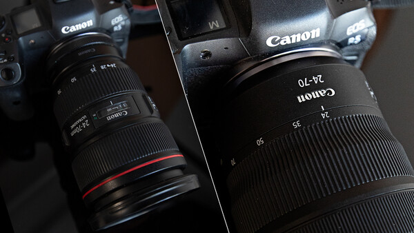 Collection of Canon DSLR cameras and lenses arranged on a dark surface.