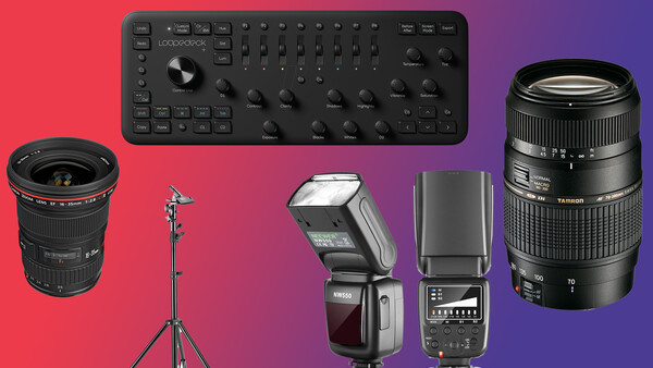 Photography and videography equipment collection arranged on a gradient background.