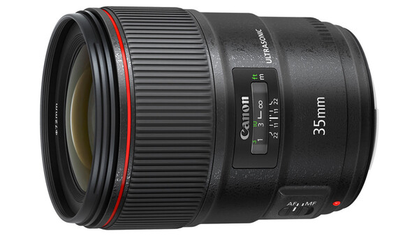 Canon EF 35mm f/1.4L USM lens with red ring and autofocus controls on black barrel.