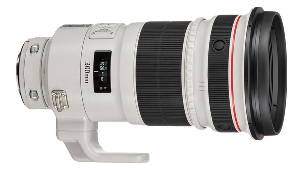 Canon EF 300mm f/2.8L IS USM telephoto lens with white barrel and tripod collar.