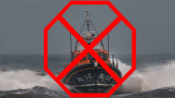 Lifeboat in rough seas with a red prohibition symbol overlaid.