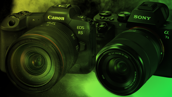 Canon EOS R5 and Sony α7 mirrorless cameras positioned side-by-side against a green-tinted background.